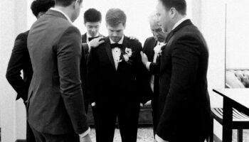 Small Prep Suite Garey House Groom Getting Ready Groomsmen Praying Quiet Moment